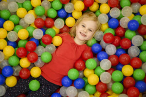 girl-ball-pit-top-view